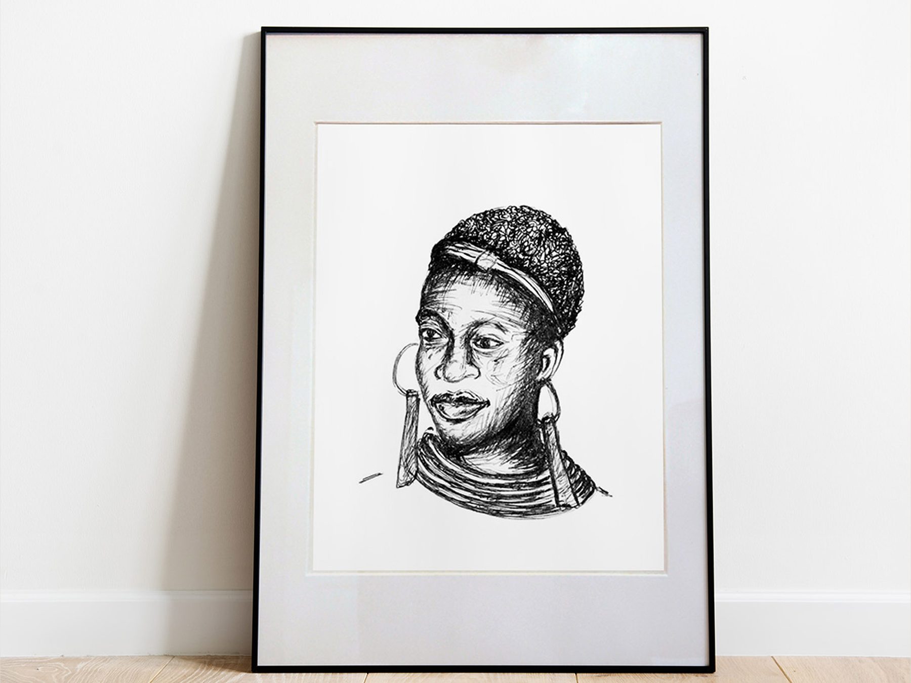 Framed ballpoint pen drawing of a woman with a large earring, leaning against a white wall